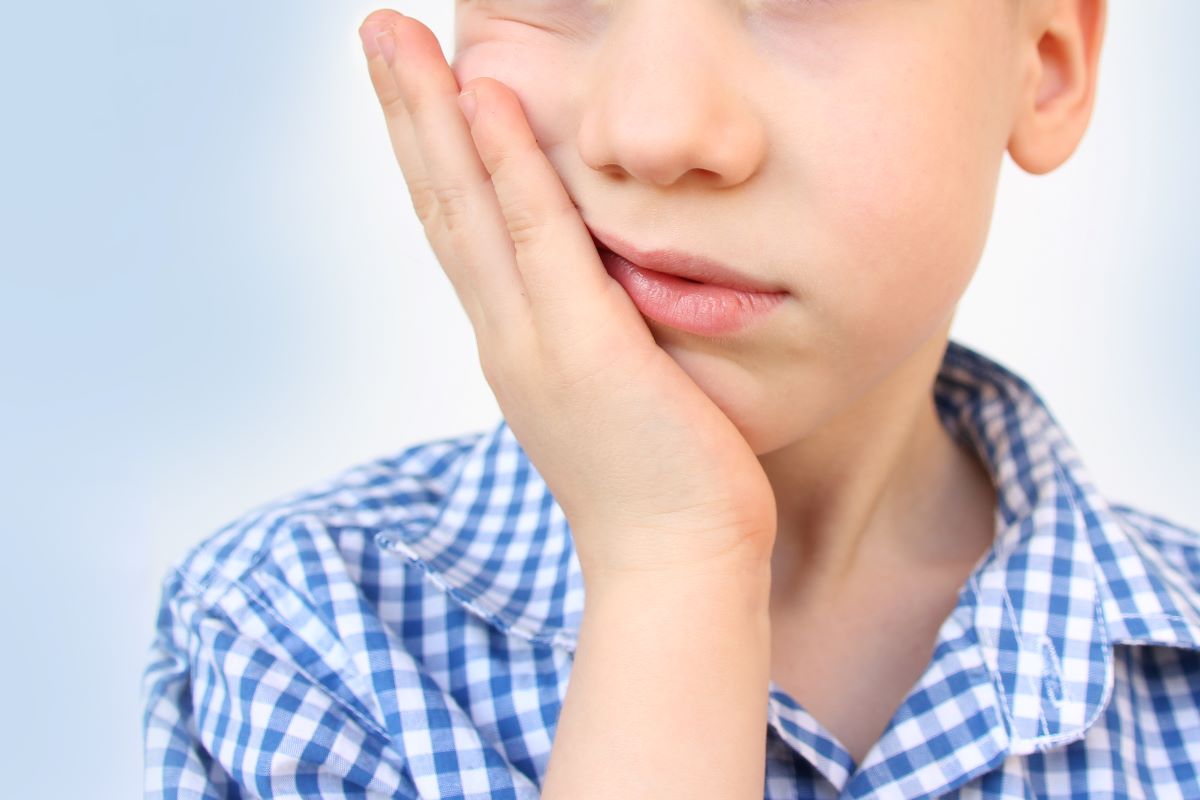 Boy Experiencing Dental Emergency